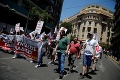 Grécko schválilo posledný balík nepopulárnych reforiem: V Aténach protestovalo 3-tisíc ľudí