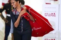 Obamová s červeným batohom: Zahrala sa na Santovu pomocníčku!