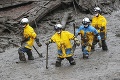 Japonskí záchranári robia, čo môžu: Zosuvy pôdy majú už tretiu obeť, silný dážď neustáva