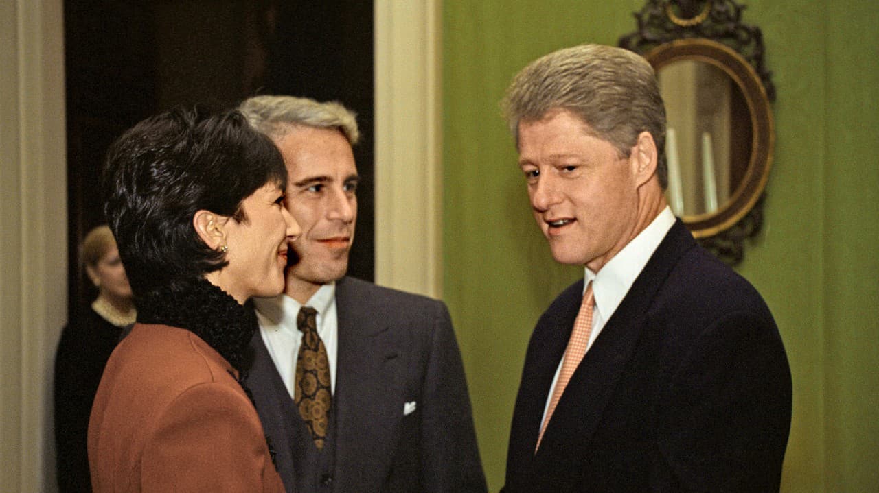 Bill Clinton (vpravo) na jednom zo stretnutí s fi nančníkom (vľavo)