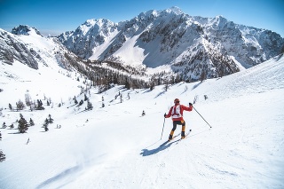 Men ski touring in the mountains on snow, exploring the Dolomite.