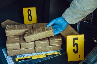 Packages of narcotics in car trunk. Drug smuggling.