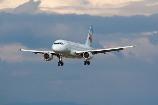 'Vancouver, Canada - August 18, 2007: Air Canada's Airbus 319 on final approach to Vancouver International Airport.'