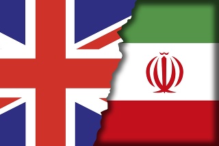 UK Iran confrontation symbolized with the british and iranian torn flags overlap each other