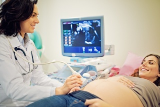 Doctor is screening pregnant woman in the hospital