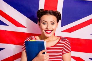 Close-up portrait of her she nice cute charming glamorous lovely winsome sweet attractive cheerful girl wearing striped t-shirt bachelor isolated over british flag background.