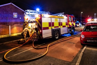 Meir Hay, Stoke on Trent, Staffordshire - 16th February 2019 - Fire engines and firemen attend an emergency house fire on a quiet housing estate in the city caused by a fault washing machine wiring