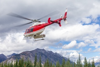 A passanger and rescure helicopter in flight.