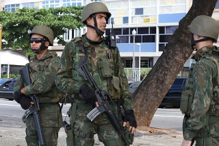 Rio de Janeiro, Brazil, July 29, 2017: After collapsing public safety systems, the Federal Government intervened with approximately 10,000 Navy, Army and Air Force personnel to ensure public safety and combat drug trafficking and theft of cargo in the State of Rio de Janeiro. In this image: Marines patrol the Copacabana Beach.
