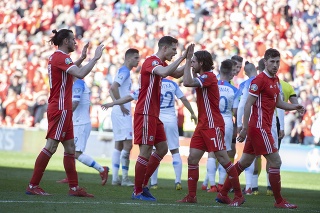 Na snímke radosť hráčov Walesu po víťazstva nad Slovenskom 1:0 v zápase  E-skupiny kvalifikácie.