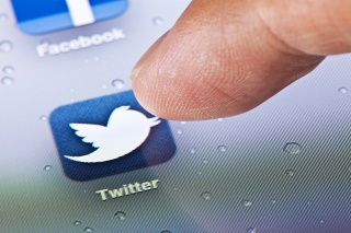 Hong Kong, China - July 23, 2011: Macro image of clicking the Twitter icon on an iPad screen
