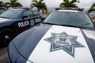 Oaxaca, Mexico - October 22, 2008 : Two Mexican Federal Police car units parked in parking lot in Oaxaca, Mexico. 