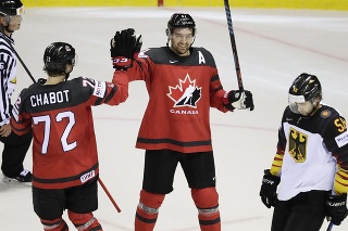Hokejisti Kanady v zápase proti Nemecku. 