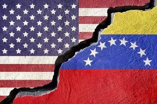 Concept american and Venezuela flag on cracked background