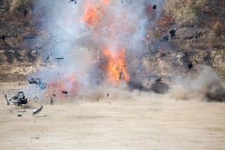 fire and movement of car part blown away from explosion in post blast investigation course training