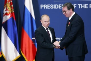 Putin, spolu s prezidentom Vojčičom.