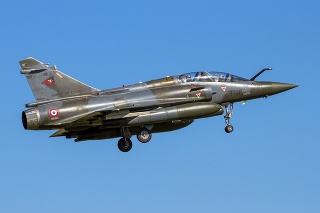 LEEUWARDEN, THE NETHERLANDS - APR 21, 2016: French Air Force Dassault Mirage 2000D jet fighter plane from Escadron de Chasse 2/3 landing on Leeuwarden airbase during military exercise Frisian Flag.
