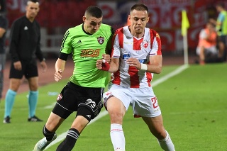 Na snímke vľavo hráč FC Spartak Trnava Erik Jirka a Milan Rodič (Belehrad) v prvom zápase 3. predkola Ligy majstrov.