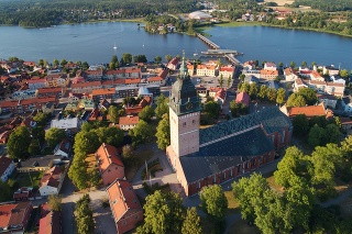 Strangnas, Sweden - July 16, 2018: Aerial view of the scandinavian brick gothic Strangnas cathedral surronded by the town.