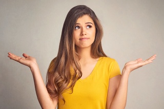 Shot of an attractive young woman supporting copy space with her hands