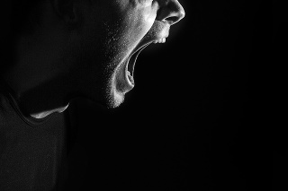 screaming angry aggressive militant guy, man, black and white portrait, evil face, teeth