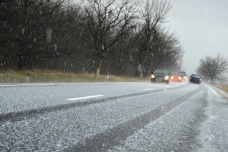Hailstorm on the road in a summer day