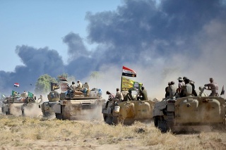 Iracká armáda víťazne vchádza do mesta Havídža.