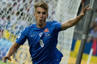 Na snímke Martin Chrien (Slovensko) sa raduje z úvodného gólu.
