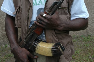 A Muslim Rebel clutches his AK-47 in a country full of unrest.