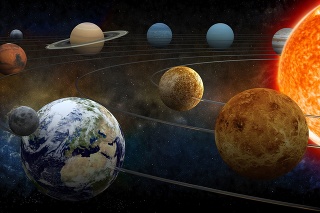 The sun and nine planets of our system orbiting.