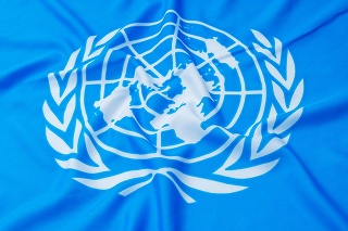 Fujian, China - April 6, 2017: Close up of United Nations flag.  The United Nations (UN) is an international organization whose stated aims are facilitating cooperation in international law, international security, economic development, social progress, human rights, and achievement of world peace.