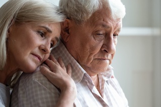 Senior spouses remember sad moments of life together, middle-aged adult daughter snuggle up to elderly father sharing his sorrows and heartache, embrace as symbol of empathy and compassion concept