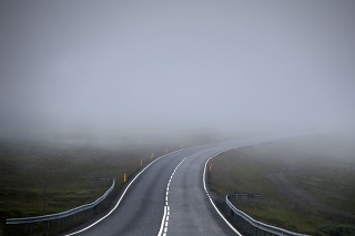 Road in fog (mist). The picture was taken in Iceland in July 2017