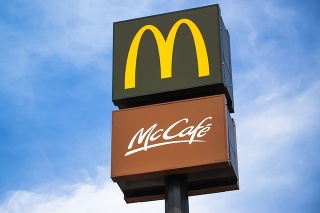 Novi Sad, Serbia - May 5, 2015: McDonalds and McCafe Signs on Post to mark fast food restaurant. Illustartive editorial for McDonalds expansion in Eastern Europe.