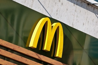 Bratislava, Slovakia - October 2, 2011: McDonald's Golden Arches Logo from a Mc Caf&egrave; store in central square of Bratislava, capital of Slovakia. This food chain entered in Eastern European countries just after the fall of Berlin Wall in 1989