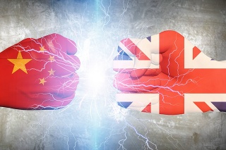 Human fists in national colors. UK vs China