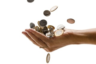 Hand catching falling coinsREAL $ Brazilian money