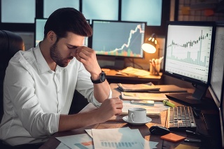 Depressed frustrated trader tired of overwork or stressed by bankruptcy, sad shocked investor desperate about financial crisis or money loss, upset businessman having headache massaging nose bridge