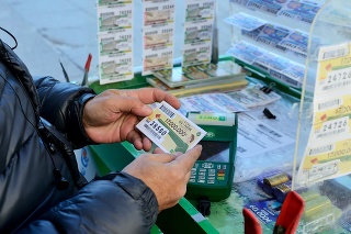 Madrid, Spain - February 19, 2016: Street seller selling lottery tickets on the streets of Madrid. Close up view.