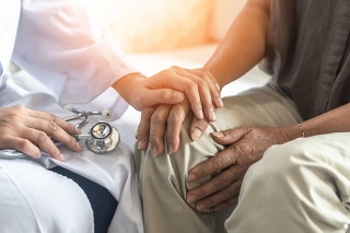 Parkinson's disease patient, Arthritis hand and knee pain or mental health care concept with geriatric doctor consulting examining elderly senior aged adult in medical exam clinic or hospital