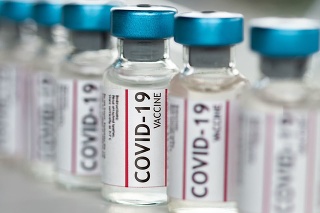 Covid-19 Coronavirus Vaccine vials in a row macro close up