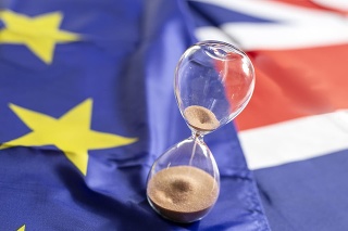 Out of time for brexit, hourglass over european and britain flag