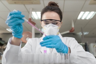 Female scientist working in the CDC laboratory.