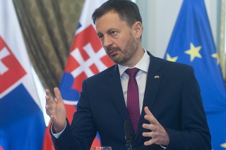 Na snímke slovenský premiér Eduard Heger počas tlačovej konferencie s predsedom Belegického kráľovstva Alexandrom De Croo.