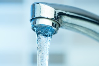 Pouring water from a Faucet high quality and high resolution studio