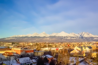 Mountains over colorful buildings and houses at Poprad, Slovakia. Morning