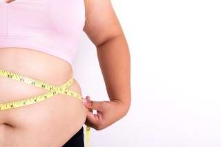 Women body fat with measure tape. Health care concept.