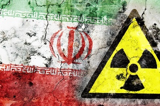 Old cracked wall with radiation warning sign and painted flag, flag of Iran