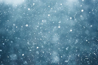 snowfall on the blurred background