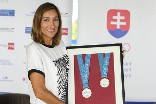 Martina s najvzácnejšími kovmi, ktoré získala – dvomi striebrami z olympiády v Sydney.